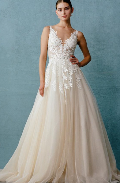 Vestido de novia en corte A con tirantes de encaje