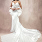 Vestido de Novia  largo de cuentas con capa de organza con volantes brillantes y escote corazón pronunciado. Largo hasta el suelo.