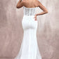Vestido de Novia  largo de cuentas con capa de organza con volantes brillantes y escote corazón pronunciado. Largo hasta el suelo.