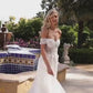 Vestido de novia con encaje al hombro