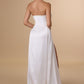 Vestido de Novia Escote palabra de honor con falda drapeada asimétrica y abertura alta en la pierna.Color Off White