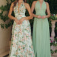 Vestido Estampado Floreado  Escote halter pronunciado con cinturilla fruncida y detalle de lazo en la espalda Color Sage.