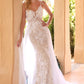 Vestido de novia de encaje con sobrefalda